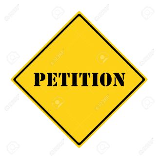 A yellow and black diamond shaped road sign with the word PETITION making a great concept.